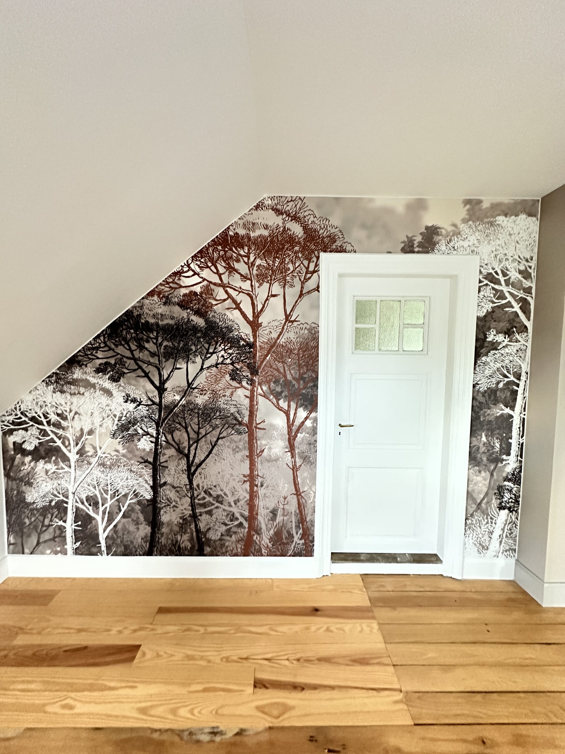 Toile tendue mur imprimé forêt dans une chambre voiron